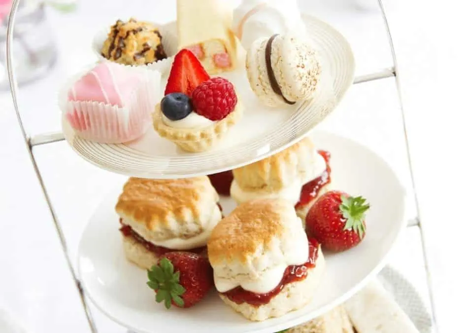 tea party food on a three tiered stand