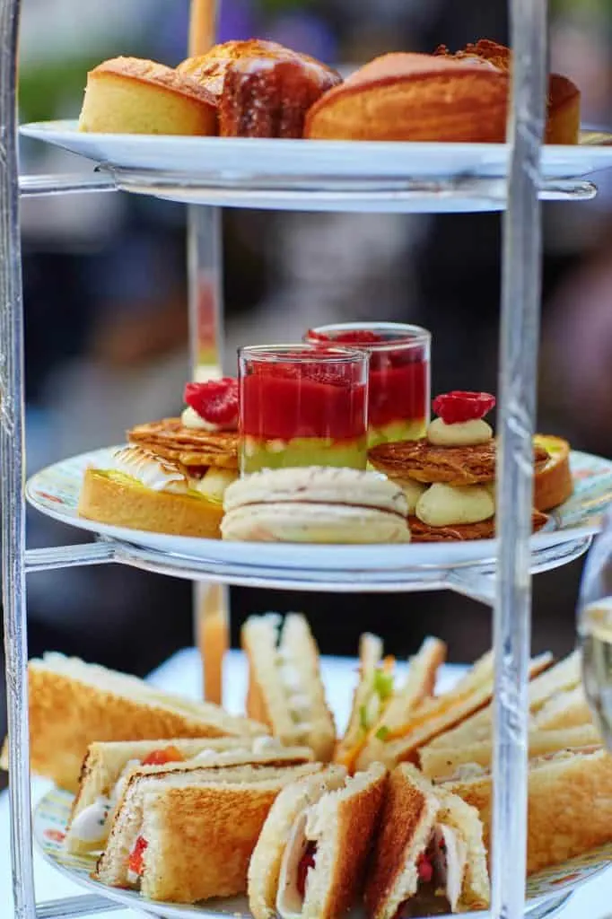 high tea meal on a three tiered tray