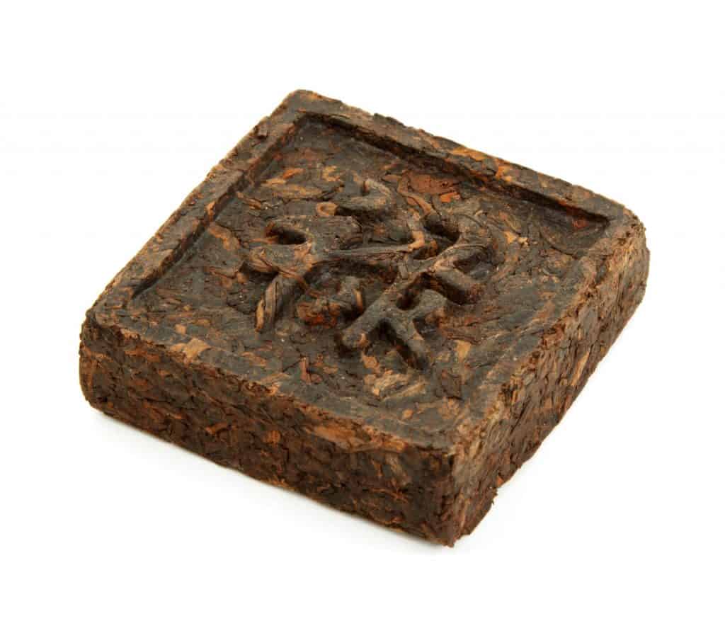 pu-erh tea block with chinese characters